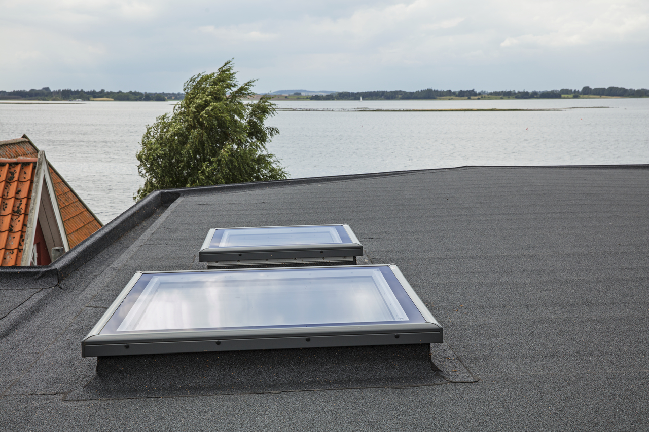 Вікна для плоских дахів Velux
